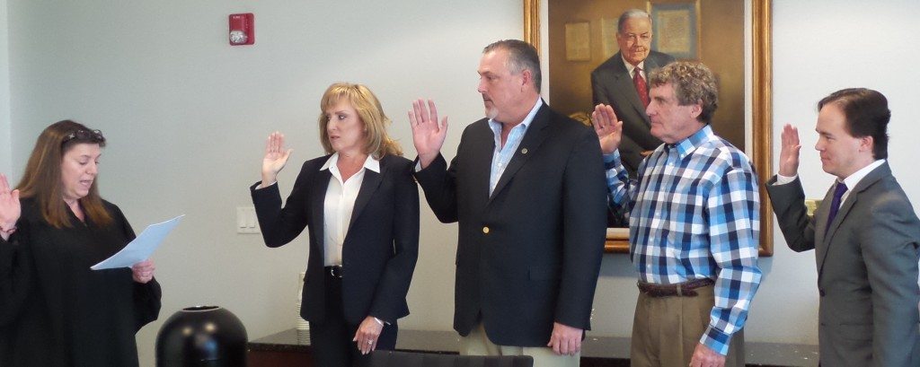  Judge Catherine Peek McEwen the U.S. Bankruptcy Court for the Middle District of Florida swears in Kathleen McLeroy, Greg Coleman, Thomas Oldt, and James Haggard as board members of the Florida Justice Technology Center Sept. 11 in Tampa. Not pictured is board member Adriana Linares, who was sworn in later.