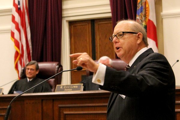 Bruce speaking at supreme court