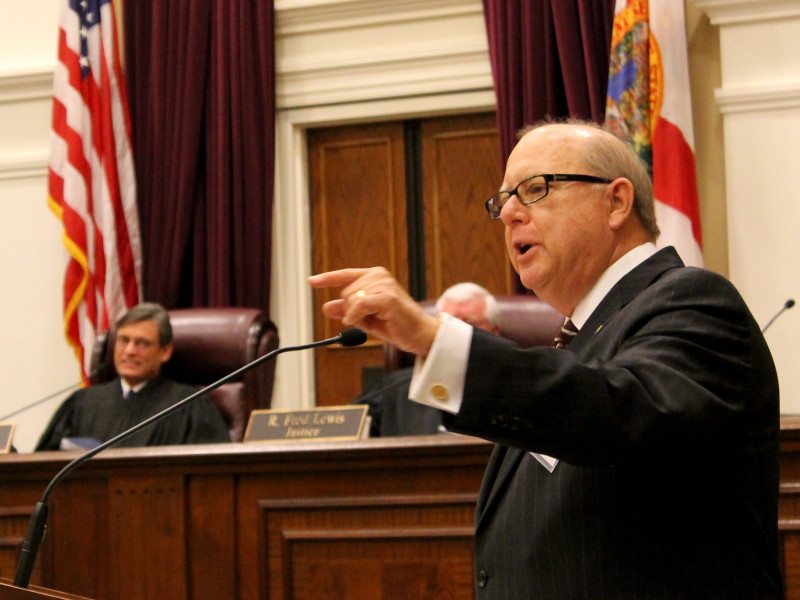 Bruce speaking at supreme court